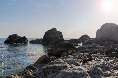 Rocky seashore on a summer day, Crimea © nndanko
