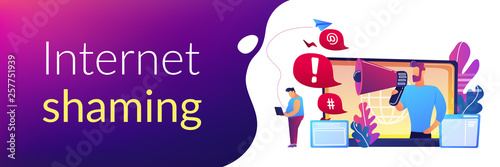 Target individual with laptop attacked online by user with megaphone. Internet shaming, online harassment, cyber crime action concept. Header or footer banner template with copy space.