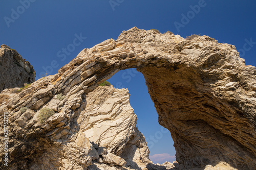 Natural arch on the Mediterranean coast. Rhodes Island, Greece. © ALTER MIND