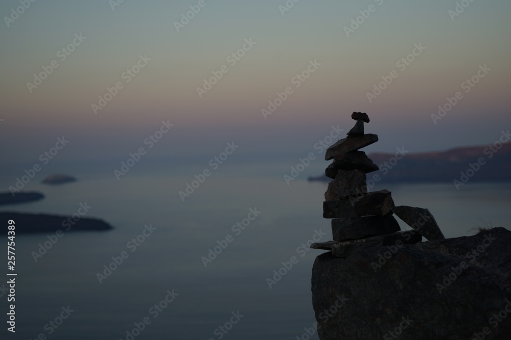 art with rocks in Santorini Greece art with rocks in Santorini Greece