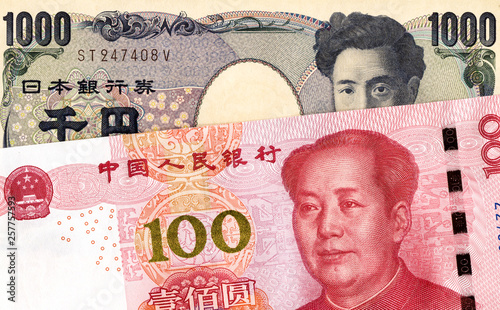 Japanese yen banknote and chinese yuan currency
