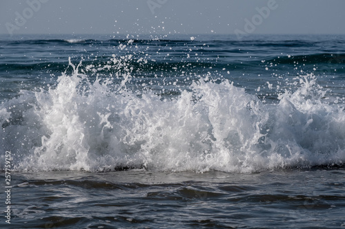waves breaking on beach