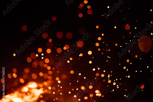 fire flames with sparks on a black background