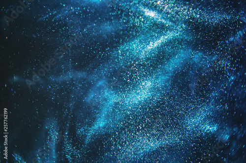 Vászonkép Abstract dark blue and emerald glitter shimmering magic underwater space background