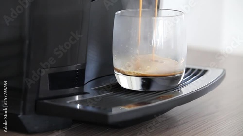 Hot Cup of Coffee Coming from Machine