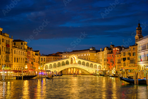 Rialto bridge Ponte di Rialto over Grand Canal at night in Venice, Italy