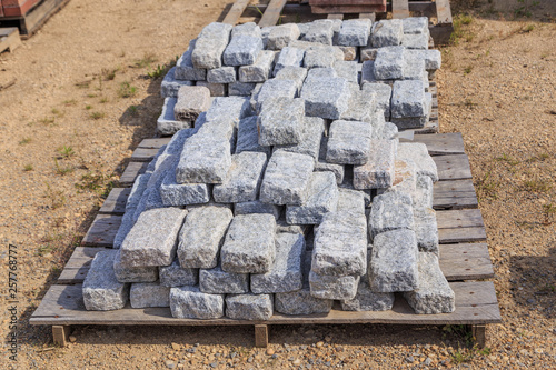 Gray Stone Ashlars or Bricks on a Palette: Palette of Gray Stone ashlars or bricks used for construction and landscaping. 