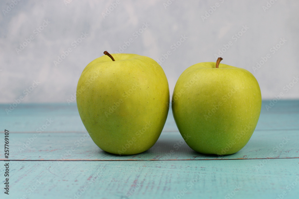 green apples on wooden ona for healthy eating green apples on wooden ona for healthy eating