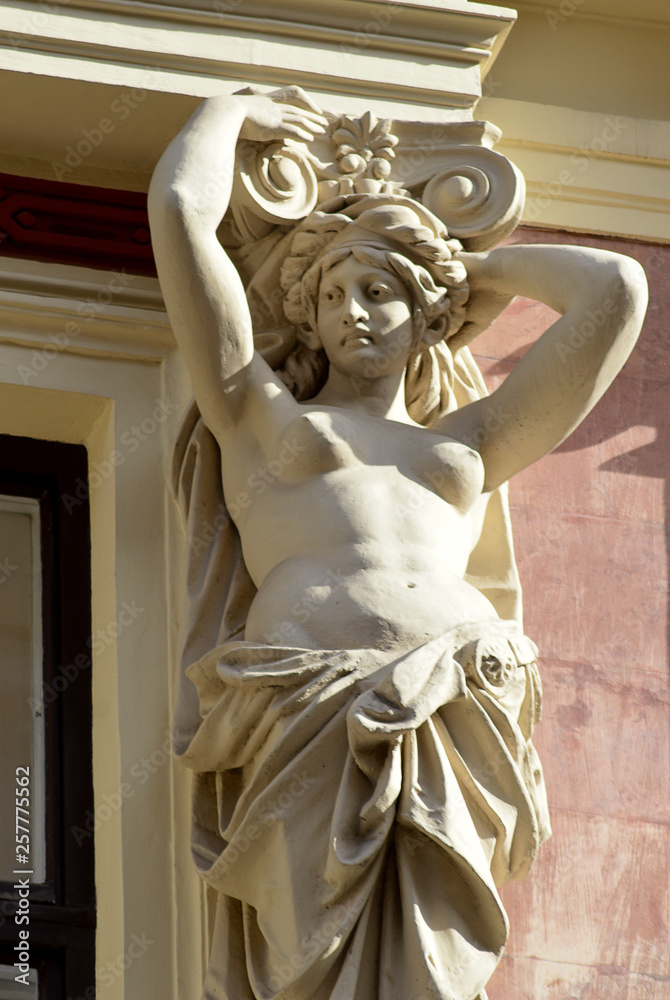 Naklejka premium A caryatid decorates a building in the centre of Vienna, Austria