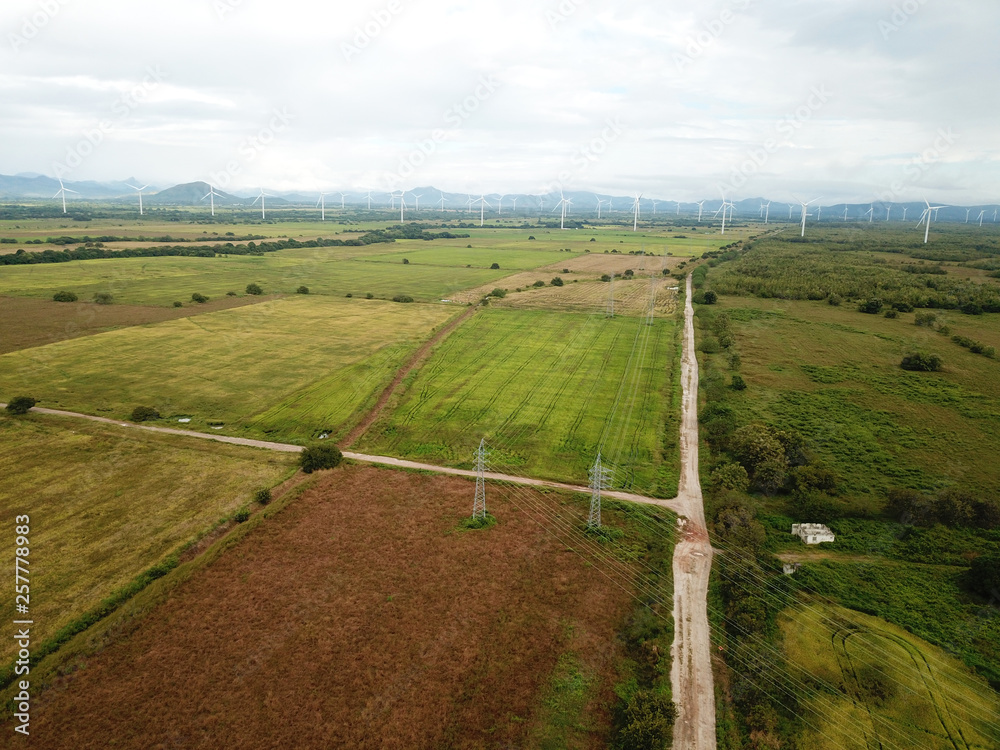 Aerial view of a wind turbines in rice fields plantation  in central Panama