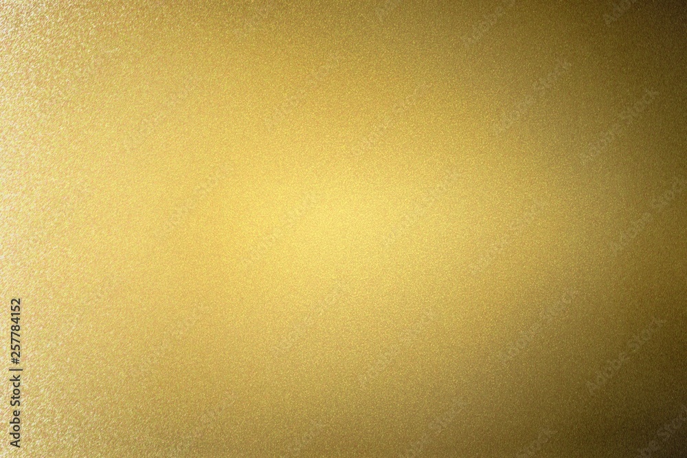 Naklejka premium Abstract texture background, reflection brushed gold metallic wall in dark room