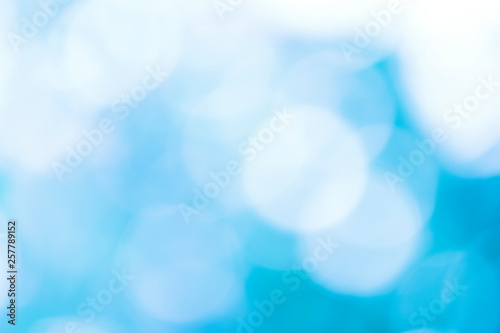 Defocused Bokeh Festive background with natural bokeh and bright lights.
