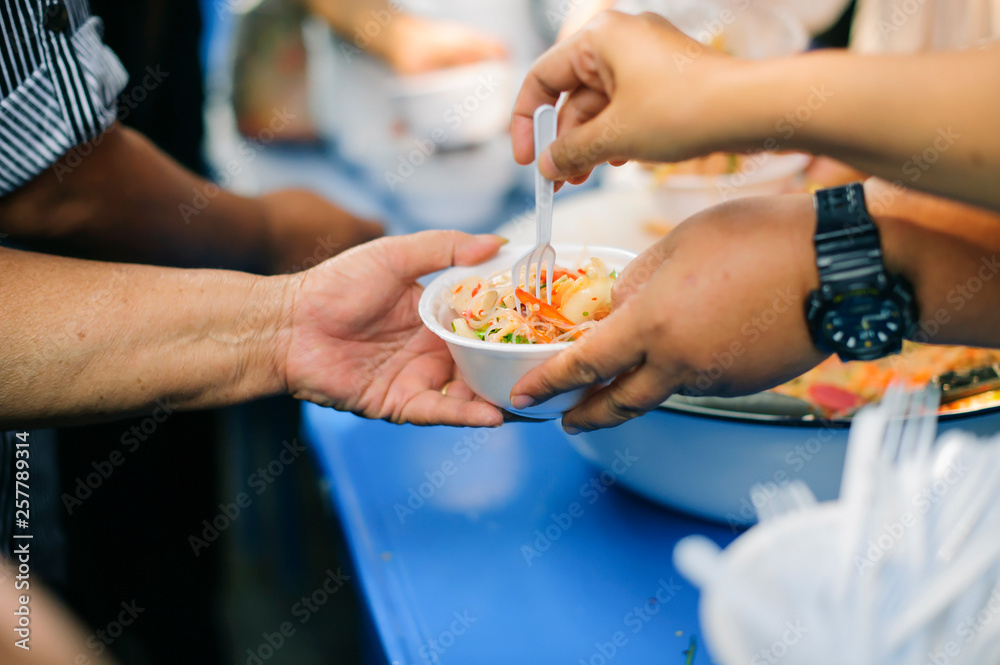 The hunger problem of the poor : homeless people receive food and charity. The hunger problem of the poor : homeless people receive food and charity.