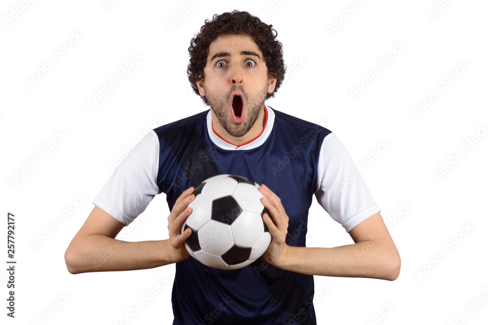 Young man in soccer football uniform screaming while his team win. Young man in soccer football uniform screaming while his team win.
