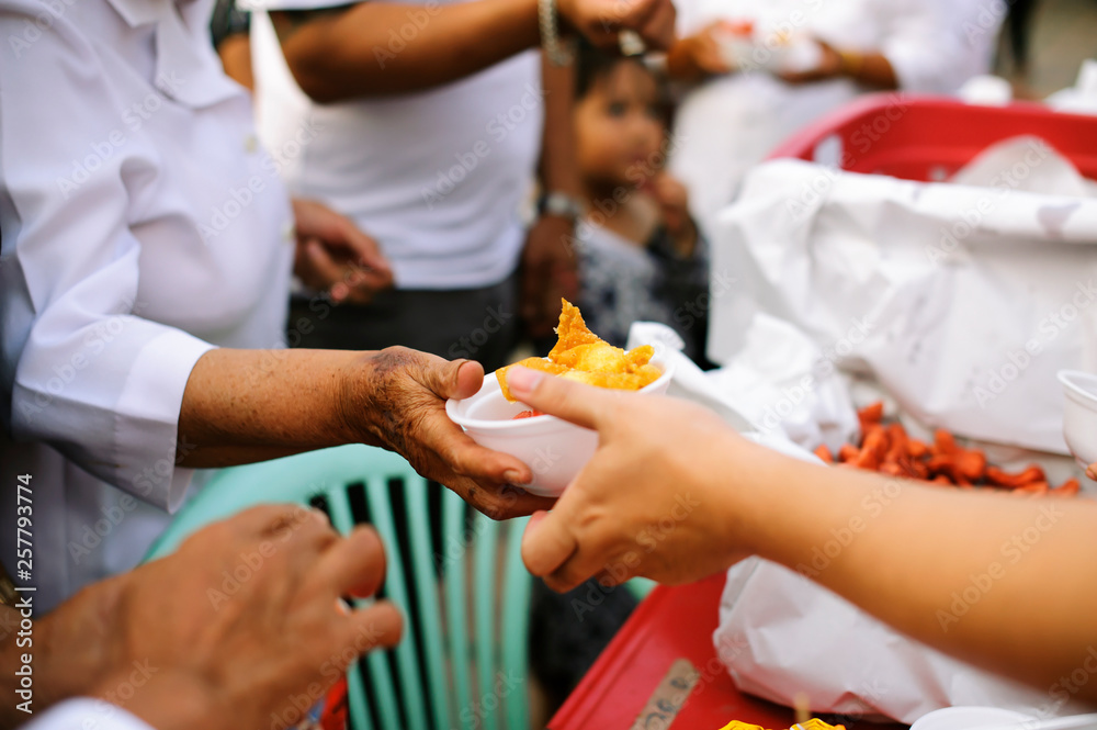 Feeding the poor Helping each other in society : Giving concept Feeding the poor Helping each other in society : Giving concept