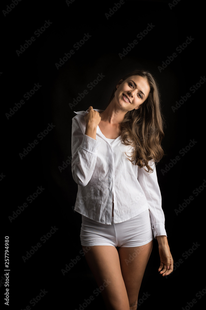 Beautiful woman with healthy body on black background Beautiful woman with healthy body on black background