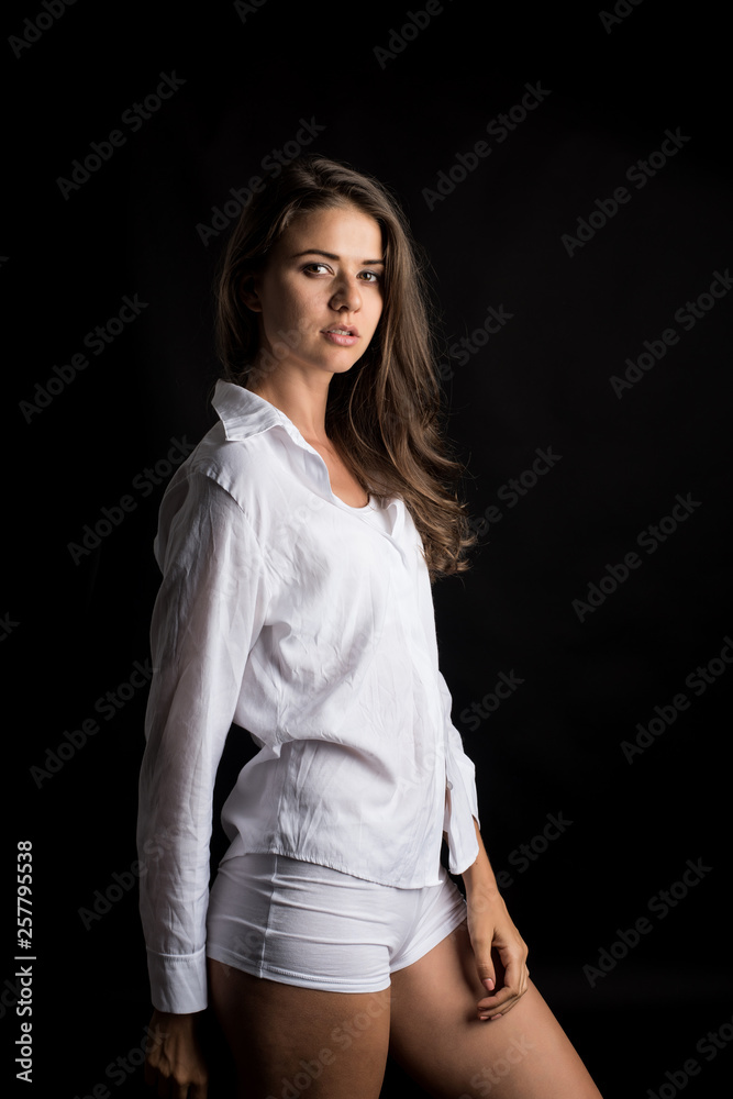 Beautiful woman with healthy body on black background Beautiful woman with healthy body on black background