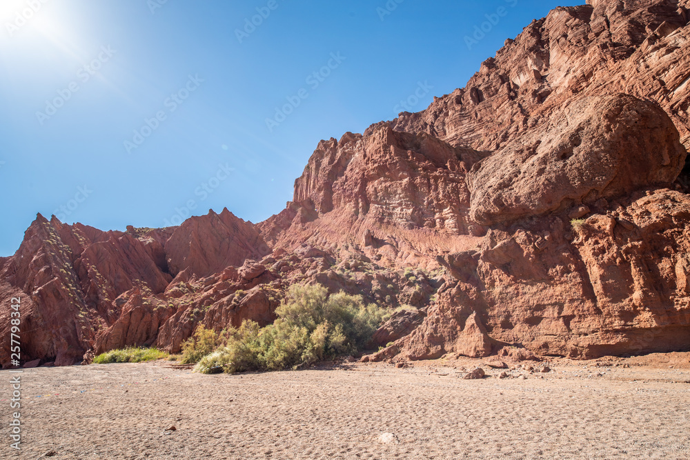 Fototapeta premium Tianshan Mysterious Grand Canyon entrance Xinjiang Uygur Zizhiqu China ，Sandstone formations in Utah USA 