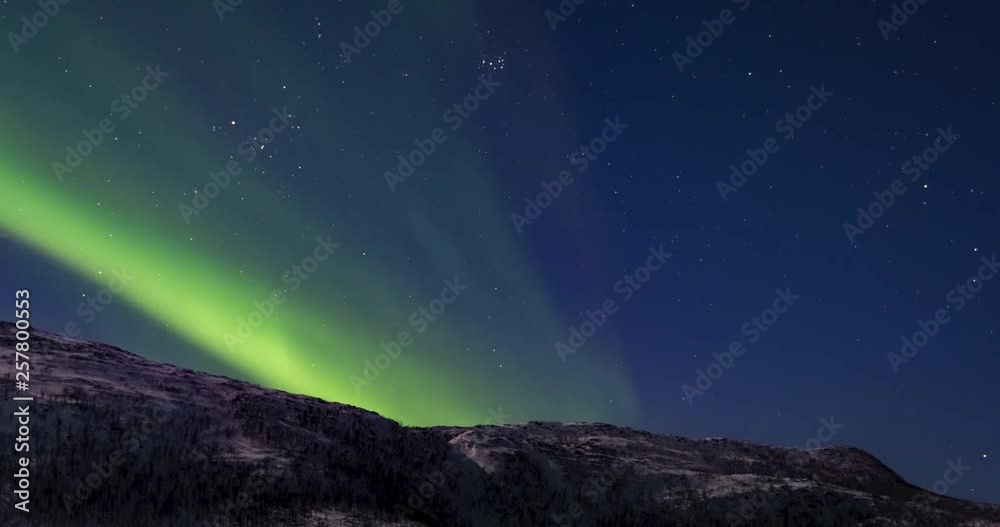 Northern Lights, polar light or Aurora Borealis in the night sky over Senja island in Northern Norway time lapse. Northern Light, northern lights, Aurora, Aurora Borealis, Aurora Polaris, Norway, ti Northern Lights, polar light or Aurora Borealis in the night sky over Senja island in Northern Norway time lapse. Northern Light, northern lights, Aurora, Aurora Borealis, Aurora Polaris, Norway, ti