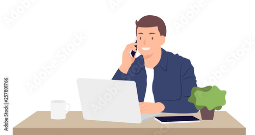 Cartoon people character design young man working on laptop and talking on the mobile phone while sitting by the desk in the office