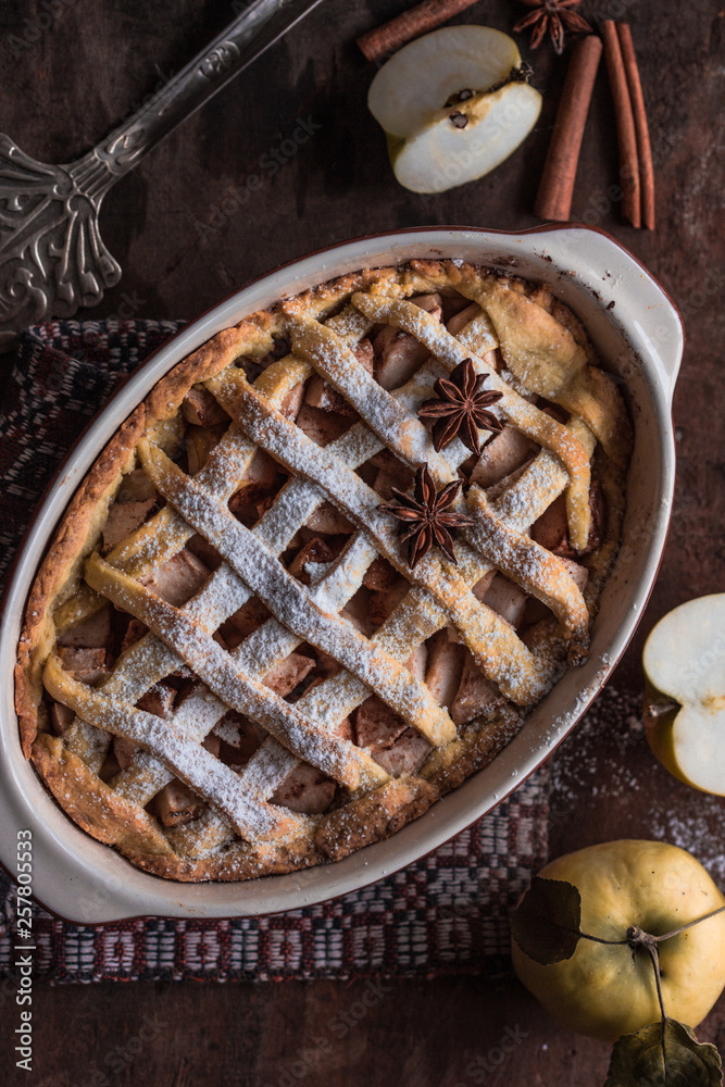 Homemade apple pie surrounded by fresh fruits Homemade apple pie surrounded by fresh fruits