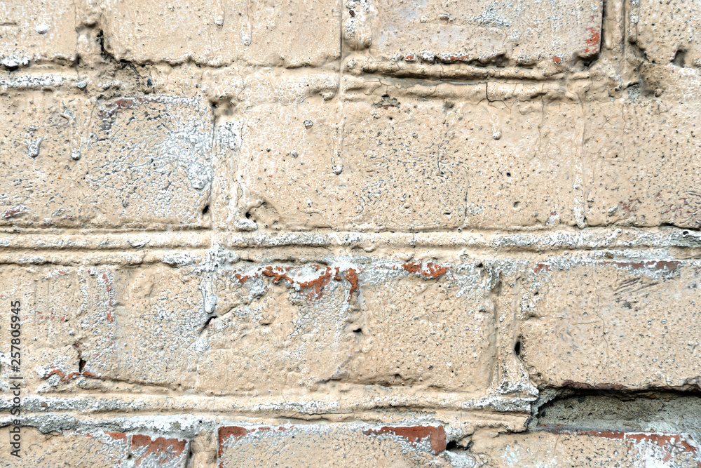 Old painted brick wall background. Brick wall texture