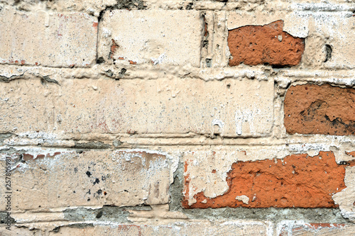 Old painted brick wall background. Brick wall texture