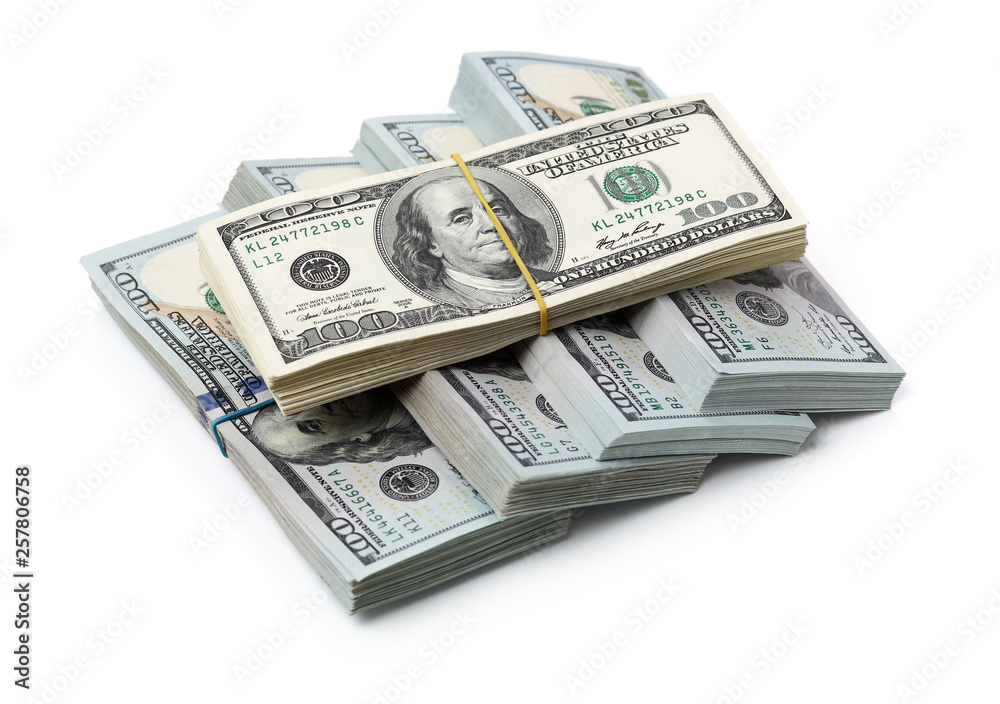 Many bundle of US 100 dollars bank notes isolated on white background Many bundle of US 100 dollars bank notes isolated on white background