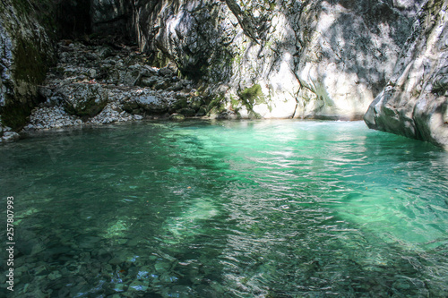 Canyon  river surrounded by forest and cliffs  turquoise water. Georgia  Okatse canyon. Summer  green trees  travel  tourism.