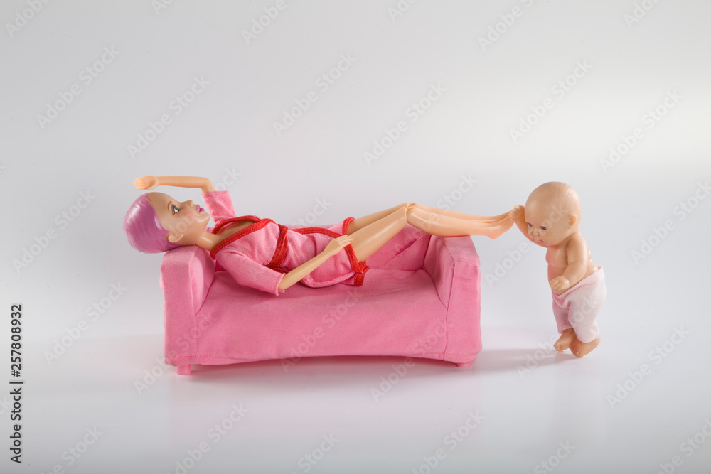 woman sits with her child, postpartum depression woman sits with her child, postpartum depression