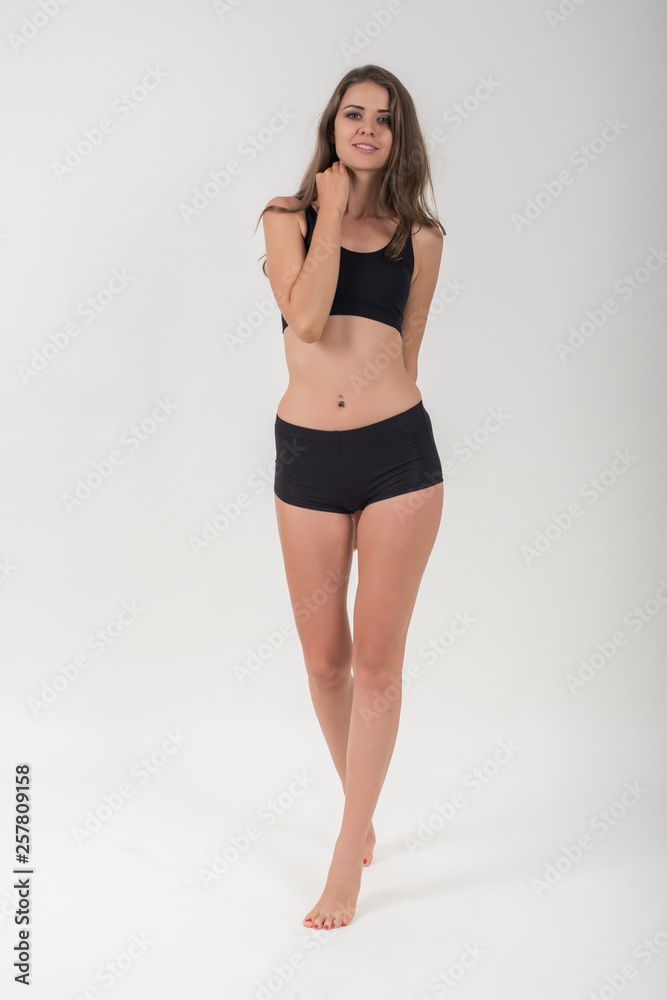 Beautiful woman with healthy body on white background Beautiful woman with healthy body on white background
