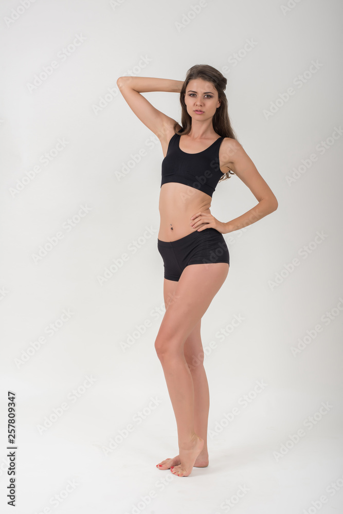 Beautiful woman with healthy body on white background