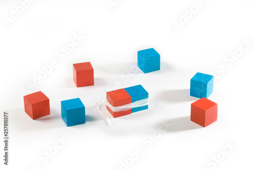 dependent relationship. multicolored cubes related thread. The complex relationship between man and woman  social ties. Dependence and psychological problems. systemic family constellations therapy