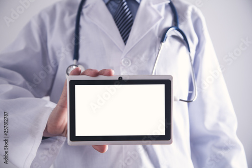 Doctor with digital tablet. Medicine and Healthcare concept