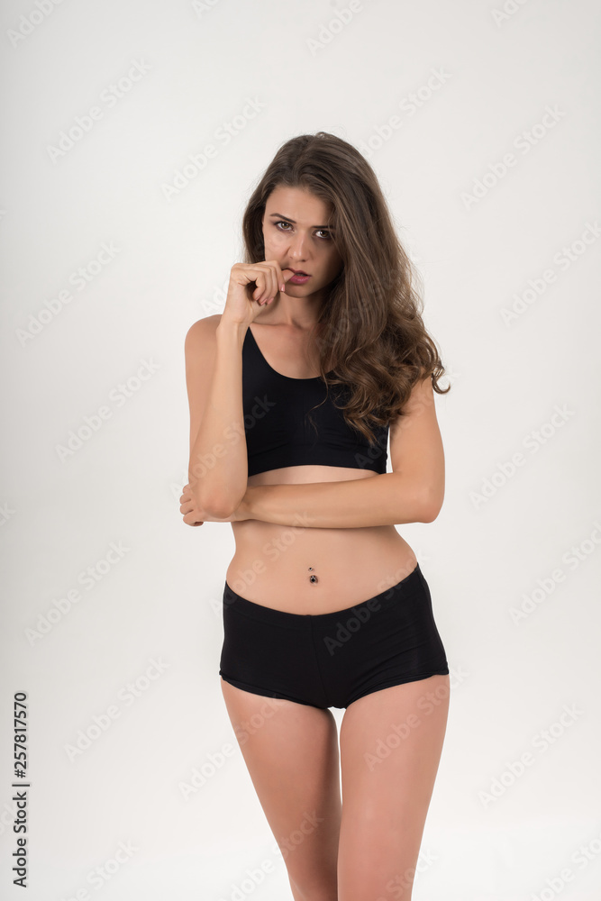 Fototapeta premium Beautiful woman with healthy body on white background