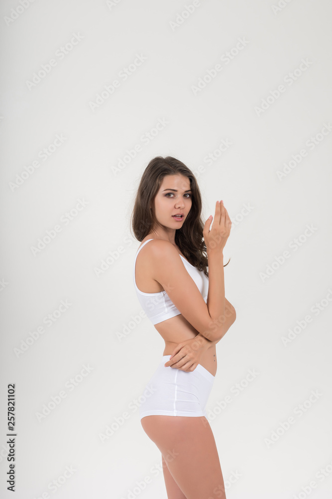 Beautiful woman with healthy body on white background Beautiful woman with healthy body on white background
