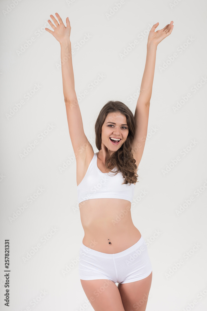 Beautiful woman with healthy body on white background