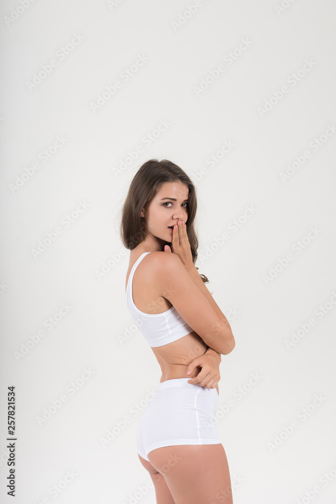 Beautiful woman with healthy body on white background Beautiful woman with healthy body on white background