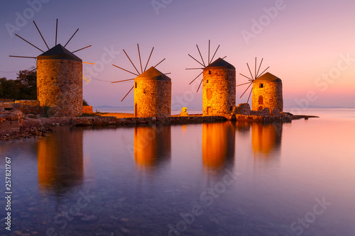 Sunrise image of the iconic windmills in Chios town. photo