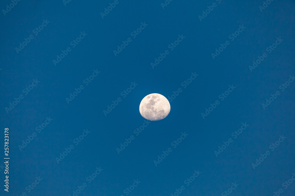 Beautiful white crescent moon over blue sky Beautiful white crescent moon over blue sky