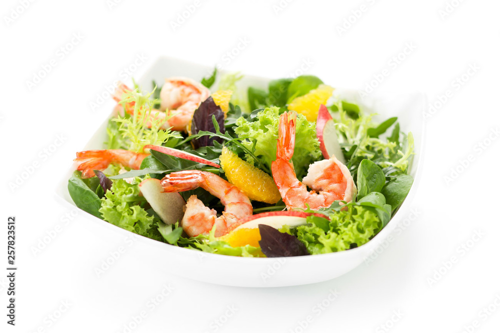 Fresh salad with shrimps on white background Fresh salad with shrimps on white background