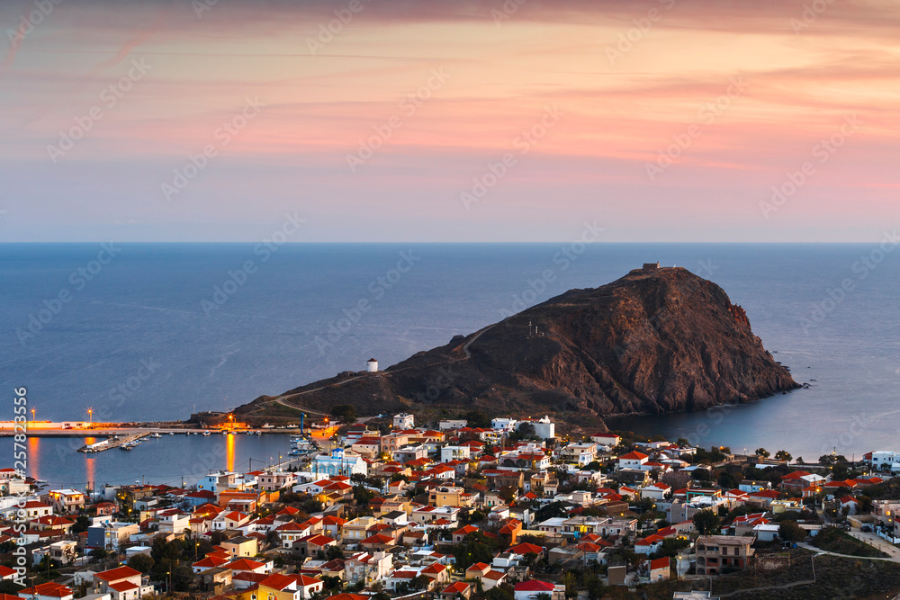 Image of Psara's main village and harbour at sunset.