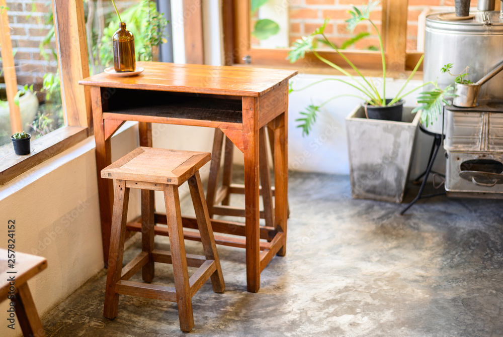 Wooden table and chairs in coffee shop