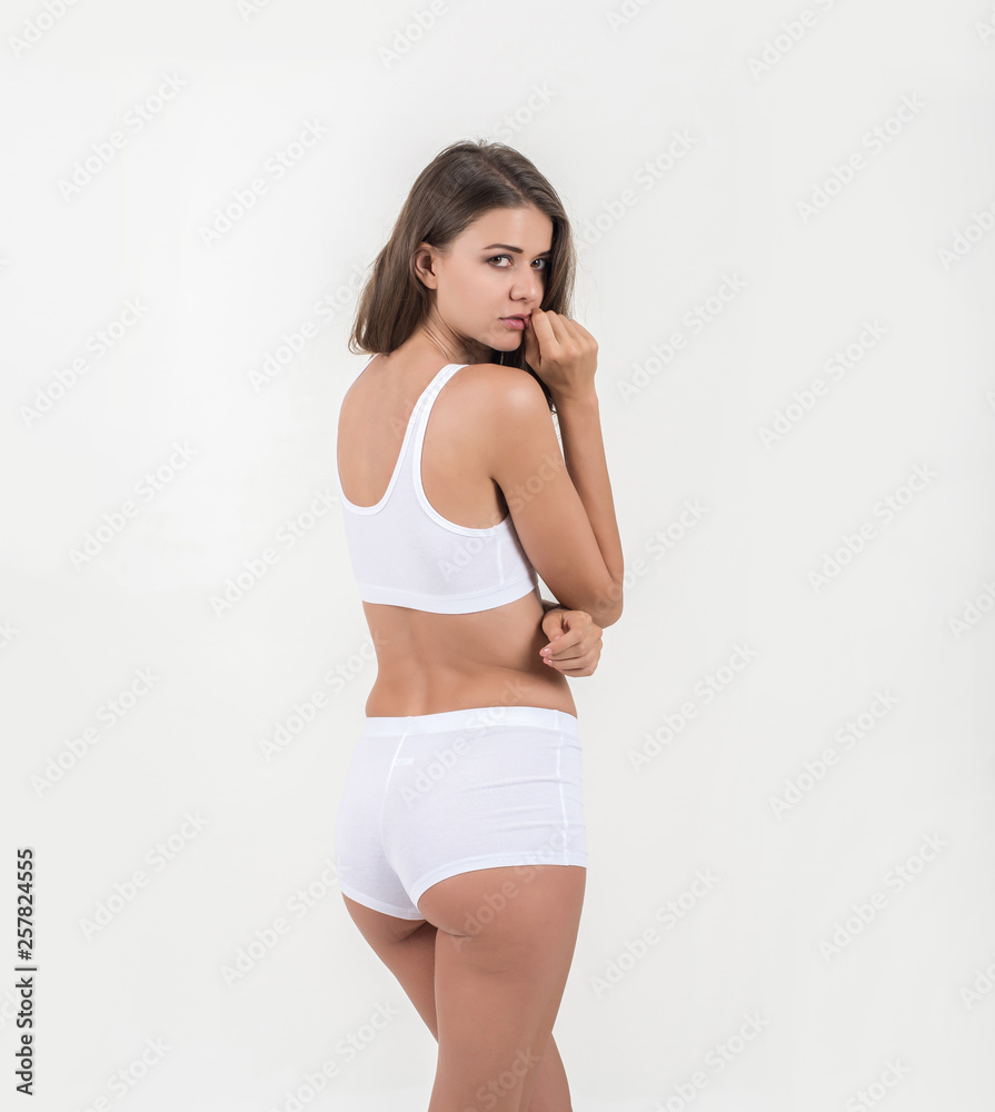Beautiful woman with healthy body on white background Beautiful woman with healthy body on white background
