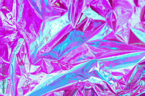 Abstract Modern bright colored holographic background in 80s style. Synthwave. Vaporwave style. Retrowave, retro futurism, webpunk
