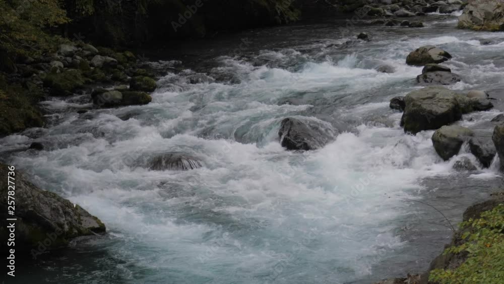 Water stream flowing through stone in the jungle. Water stream flowing through stone in the jungle.