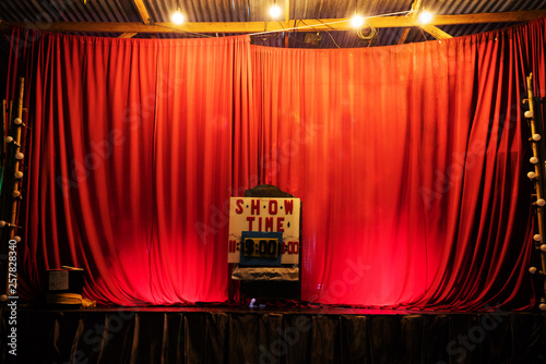 Red curtain on empty stage