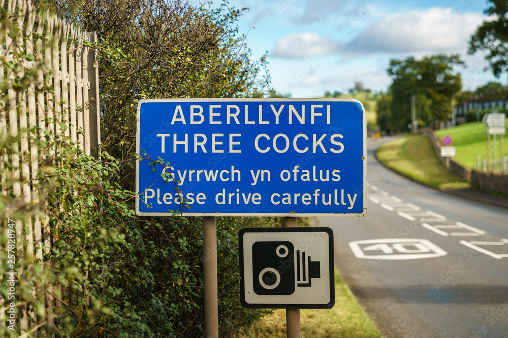 Sign: Three Cocks Please drive carefully (Welsh & English)