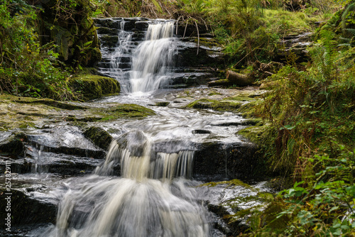 A waterfall in Blaen-y-glyn near Torpantau, Powys, Wales, UK