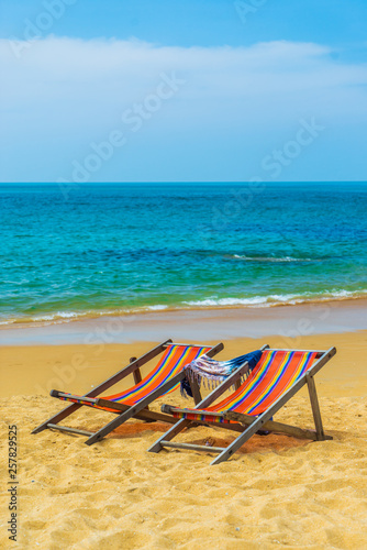 Fototapeta Naklejka Na Ścianę i Meble -  Deck chairs at the beach